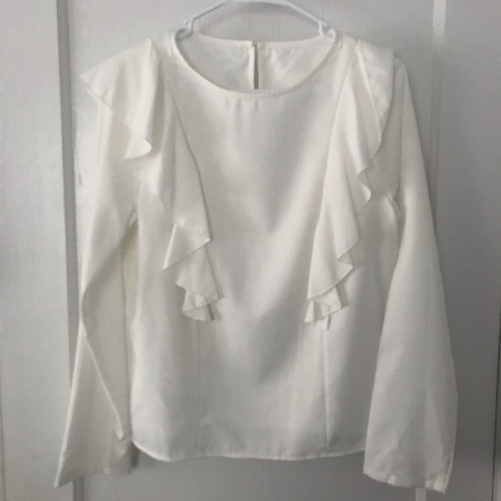 Cute white blouse with ruffels
